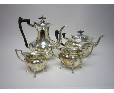 A George V silver four piece Tea and Coffee Service of shaped oval form on paw feet, Sheffield 1914, Coffee Pot 1921, maker: 