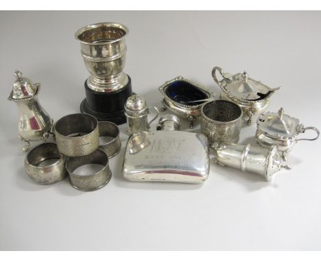 An Edward VII silver Spirit Flask, Birmingham 1901, six silver Condiments, a small Trophy and six Napkin Rings