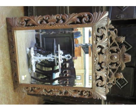 A Victorian oak large Wall Mirror with leafage scroll carved surround, 3ft 8in x 3ft