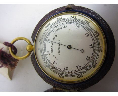 A Pocket Barometer, in original case, with instruction booklet