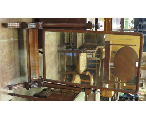 A Victorian mahogany framed Robing Mirror with rectangular plate on turned and square supports, cheval base with scroll feet 