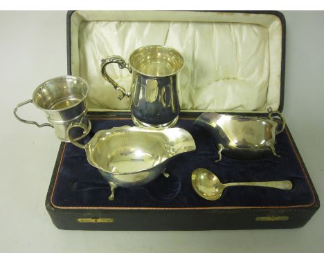 Pair of George V silver Sauce Boats and one Ladle, Birmingham 1921, in case, a baluster Mug, Birmingham 1928 and another smal