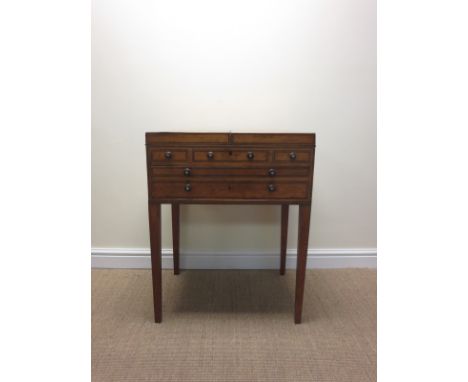 A Sheraton satinwood enclosed Dressing Stand fitted frieze pull out writing surface, drawer below, with fitted interior mirro
