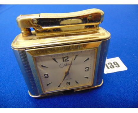 A Colibri vintage clock lighter
