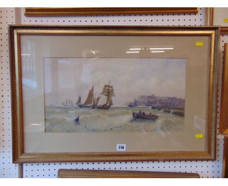 A framed and glazed watercolour seascape signed