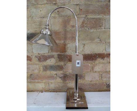 An Art Deco style plated desk lamp on stepped oblong base 