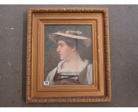 A Victorian watercolour - portrait of a young lady - initialled N.M.M. 1881 - 37cm x 7cm - in a gilt frame 
Condition report: