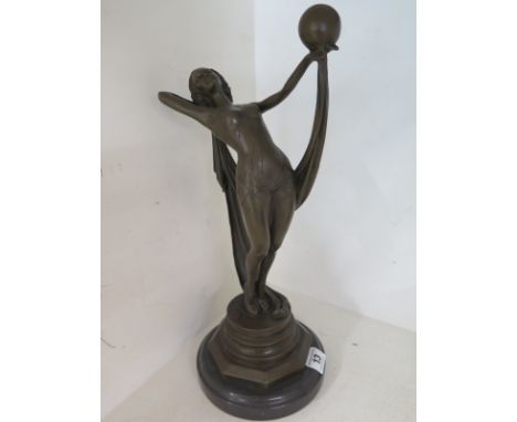 A modern bronze figure of a young lady on a marble base