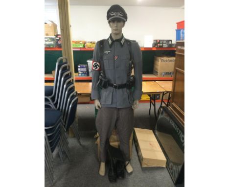 A Western Costume Company film replica of a WW2 German uniform and dummy.