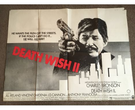 Two film posters comprising a UK quad film poster of 'Death Wish 2', folded with tears, sellotape marks, damage to corners, c