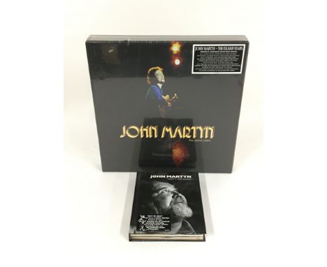 A sealed John Martyn 'The Island Years' multi CD and DVD box set and 'Ain't No Saint' CD box set (2).