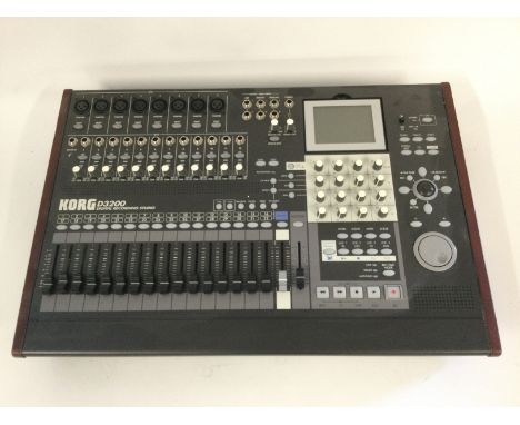 A boxed Korg D3200 digital recording studio.