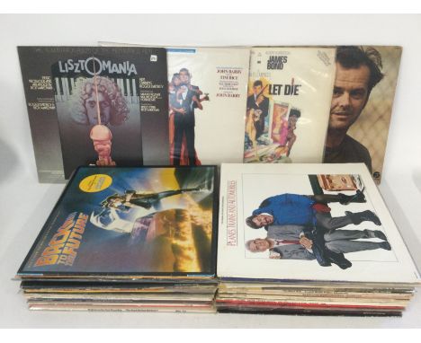 A record case of film and theatre soundtrack LPs including 'One Flew Over The Cuckoo's Nest', 'Live And Let Die', 'Back To Th
