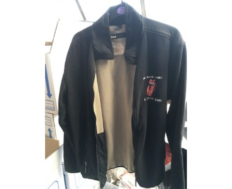 A Rolling Stones crew only tour jacket and 'A Bigger Bang' tour laminate plus a pair of stage used drumsticks as used by Quee