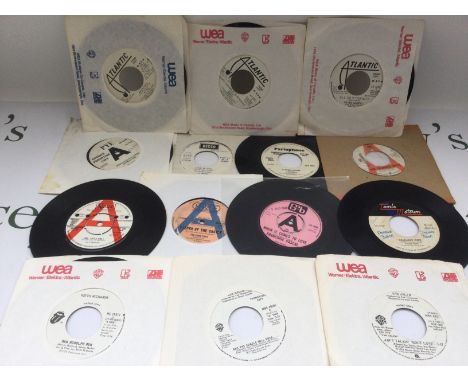 Seventeen promo discs by various artists including The Rolling Stones, The Kinks, Genesis and others.