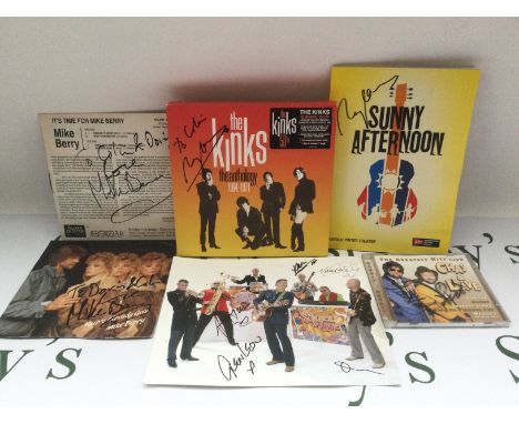 A collection of signed items including a Kinks 5CD box set signed by Ray Davies, a Chas & Dave CD, two Mike Berry records and