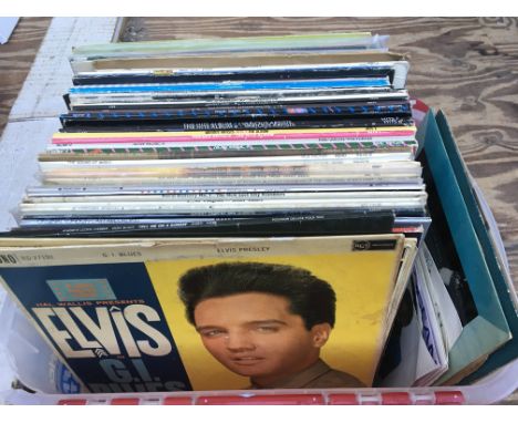 A collection of LPs, 12", 10" and 7" singles by various artists including Elvis Presley, Hall & Oates and others.