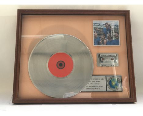 A framed and glazed limited edition platinum disc, CD and cassette display in recognition for worldwide sales of the Sing Whe