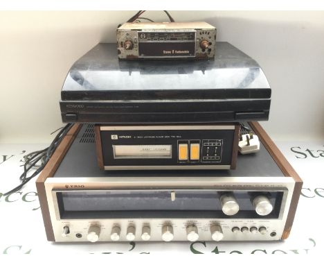 An assortment of vintage HiFi including a Hitachi 8 track player with cartridges, an in car 8 track player with speakers, a T