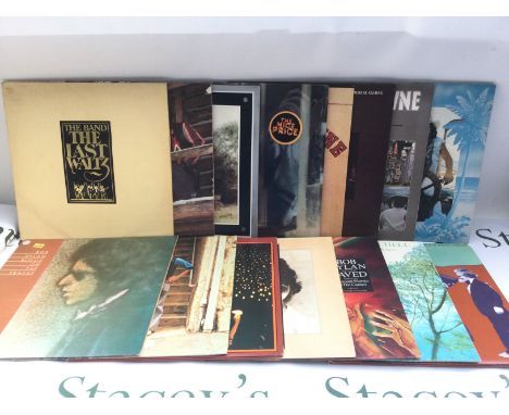 Fifteen folk rock LPs by various artists including Bob Dylan, Joni Mitchell, The Band and others. Includes two Bob Dylan prom