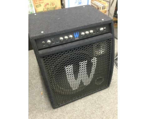 A Warwick CCL 250W 1x15" bass guitar combo amplifier with cover, user manual and power lead.