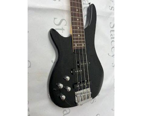 A Gear for Music Left Handed Bass Guitar in Black with chrome parts. Overall condition very good used. Comes with practice am