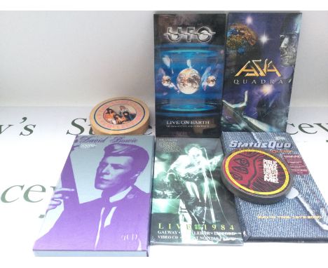 A box of CDs, DVDs, audio cassettes and VHS tapes including a David Bowie 'Sound & Vision' CD long box, PiL, UFO and many mor