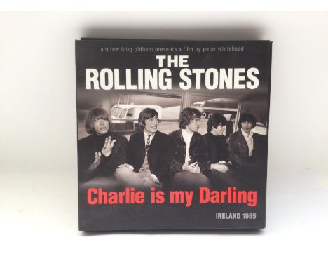 A super deluxe edition Rolling Stones 'Charlie Is My Darling' DVD BluRay box set complete with book and poster.