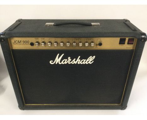 A Marshall 4102 JCM900 100W valve combo amplifier with footswitch, cover and spare Marshall potentiometers.