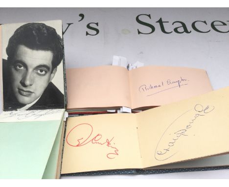 Three autograph booklets containing various names from film, music and sport including Frankie Vaughan, Pete Murray, Tommy Tr