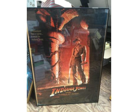 Four reproduction film posters including Indiana Jones And The Temple Of Doom, Attack Of The 50ft Woman and others plus a Jam