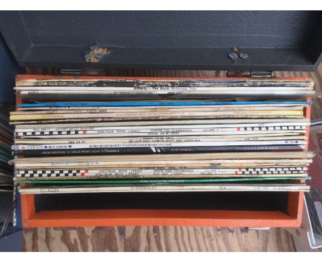 Two record cases of LPs by various artists including Elvis Presley, Oscar Peterson and others.