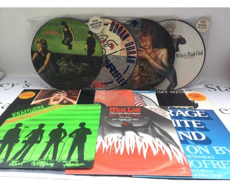 A box of LPs and 12" singles by various artists comprising many picture discs and coloured vinyl including Madonna, Duran Dur