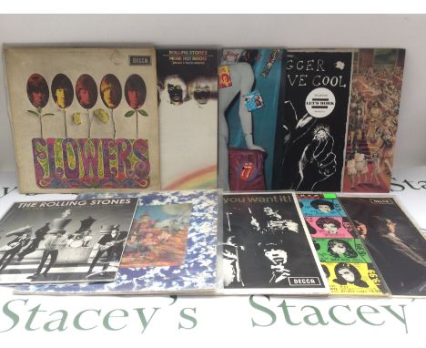 Two bags containing 20 Rolling Stones and solo LPs, EPs and a 10" disc comprising a lenticular sleeve 'Their Satanic Majestie