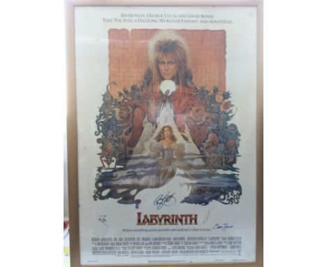 A multi signed US one sheet film poster of Labyrinth bearing the signatures of David Bowie, George Lucas, Frank Oz, Brian Hen