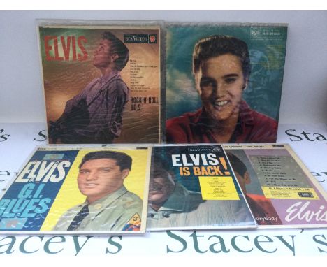 A box of Elvis Presley LPs, 7" singles, EPs, DVDs and three Elvis monthly magazines.