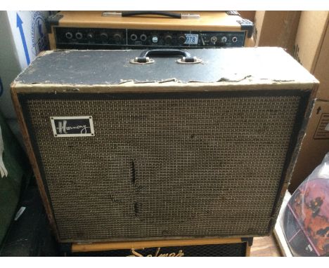 A vintage Harmony combo amplifier fitted with a Celestion GL12-35 speaker.