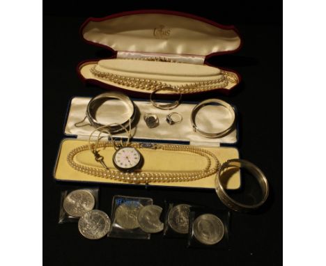 A French silver lady's pocket watch, late 19th century; a silver hinged bangle, another, a marcasite ring, a dress ring, othe