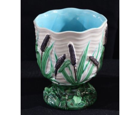 A 19th century Royal Worcester Majolica vase, moulded in relief with bullrushes, 15cm high 