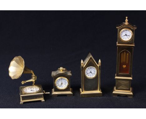 An Everite brass miniature longcase clock, 13cm, a similar brass miniature bracket clock, gramophone and mantel clock (4) 