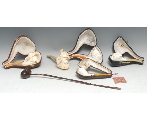 A Meerschaum pipe, carved as the head of a 17th century gentleman, 17cm long, cased; others, various, [6] 