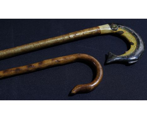 A fen walking stick, the handle modelled as a trout; another walking stick (2) 