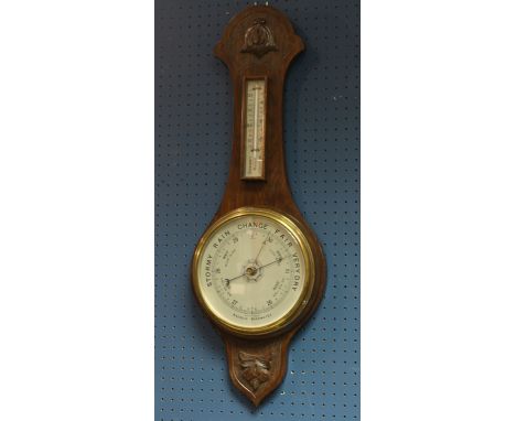 A British Made oak barometer, mercury thermometer, 74cm long 
