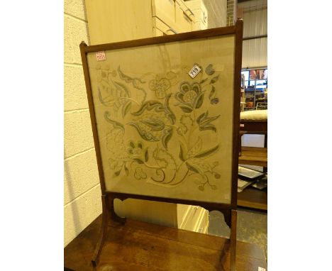 Edwardian mahogany glazed fire screen with embroidered panel