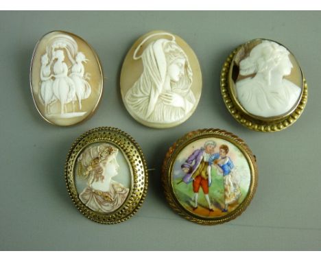 A NINE CARAT GOLD FRAMED OVAL CAMEO BROOCH of three figures with safety chain, three other cameo brooches and a circular yell