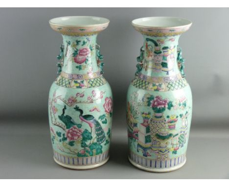A PAIR OF 19th CENTURY CHINESE CANTON VASES having opposing open decoration of peacocks amongst blossom branches and various 