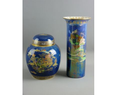 A CARLTONWARE BLUE GROUND ORIENTAL PATTERNED GINGER JAR & LID, the body depicting pagodas, flowers and figures etc and with g