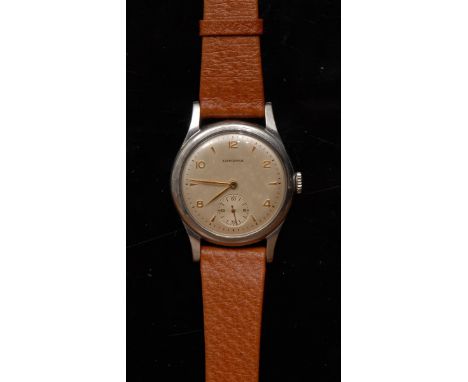Longines - a stainless steel manual wrist watch. silvered dial, alternating gold coloured metal Arabic numerals and arrowhead