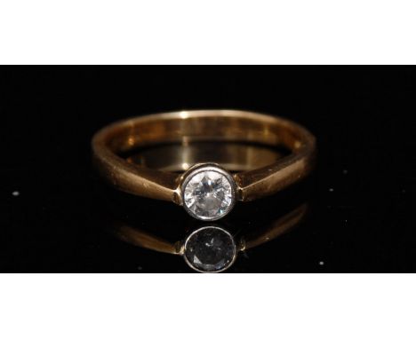 A diamond solitaire ring, round brilliant cut diamond approx 0.20ct, 18ct gold shank, size L, 3.1g gross