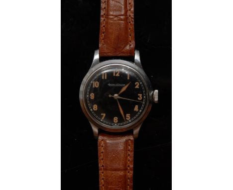 Jaeger LeCoultre - a gentleman's black dial military style wrist watch, luminous Arabic numerals and hands, centre seconds, m